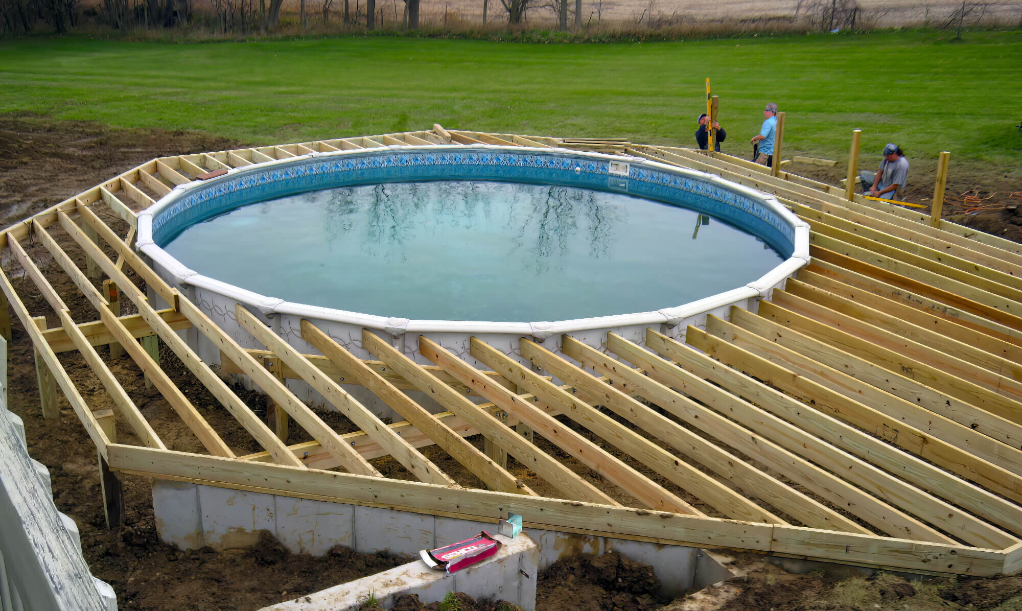 Building Deck Over Water How To Build A Deck Around A Pool | Superdeck in Above Ground Pool Deck Designs