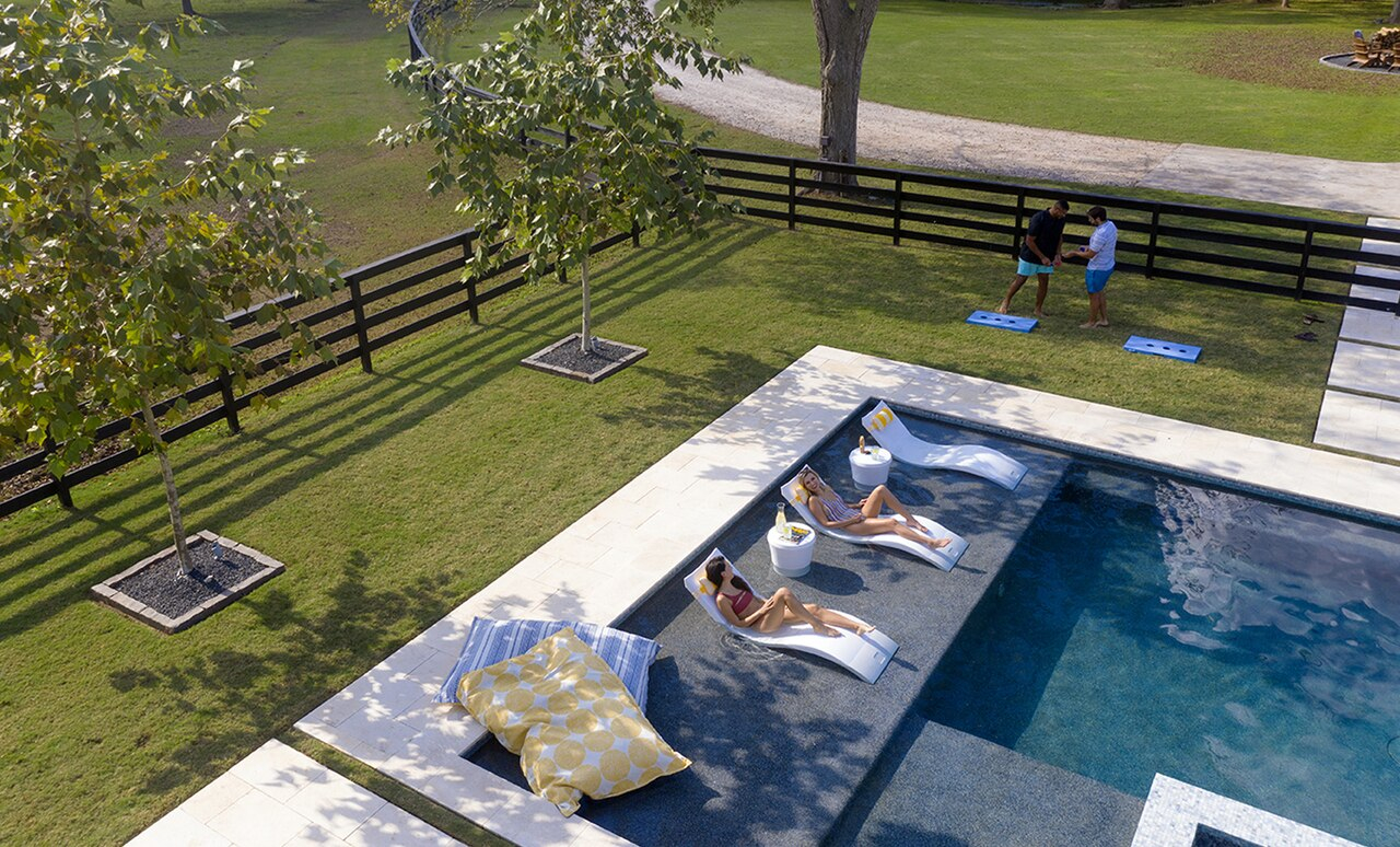 How A Tanning Ledge Enhances Your Luxury Pool - Goodall Pools & Spas intended for Transforming Shallow Water Into a Sunbathing Oasis With Tanning Ledges