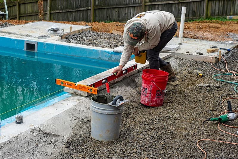 How To Lay Pool Coping Pavers: Step By Step - Eagle Pavers inside Essential Maintenance Tips to Keep Your Pool Pavers Looking New