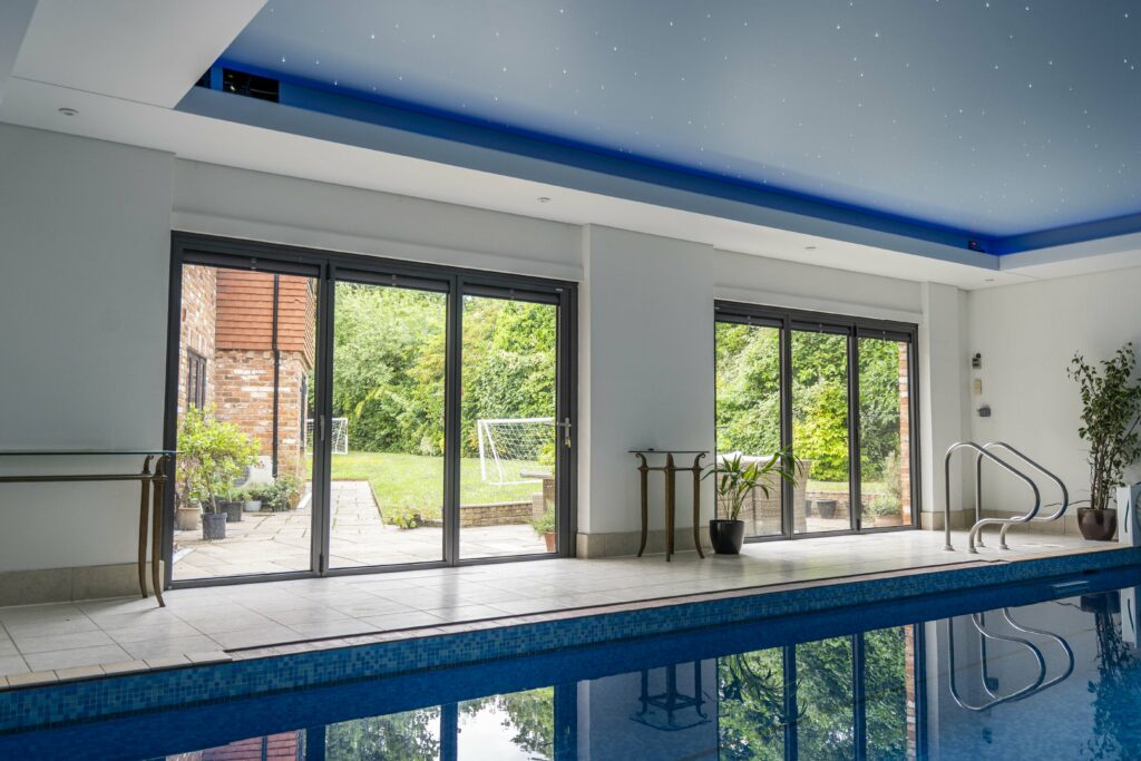 Indoor Home Pool Designs How Much Does An Indoor Pool Cost? (2025 regarding The Hidden Costs and Benefits of Adding an Indoor Pool to Your House Plan